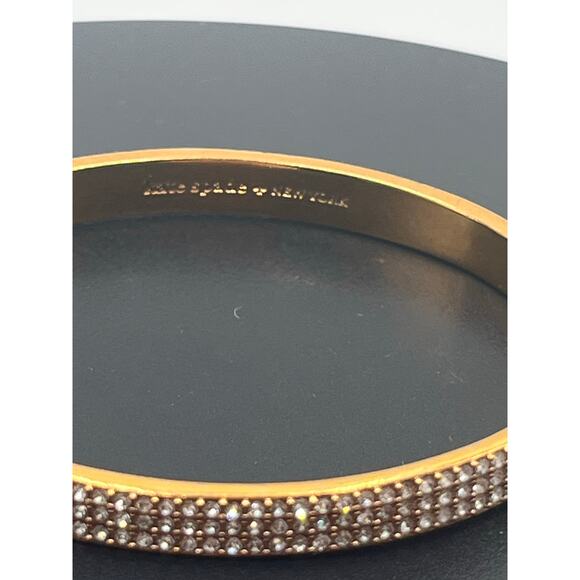 Kate Spade NY Heavy Metals Row Pave Hinged Bangle Bracelet in clear/rose gold - Picture 2 of 10